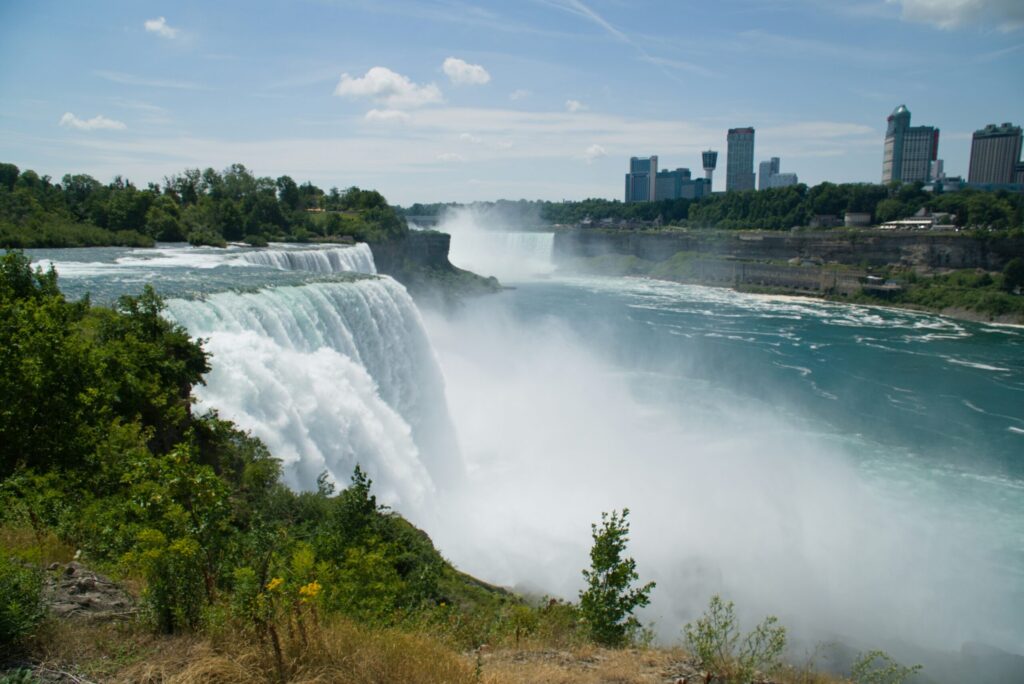 image of niagara falls waterfall with city of niagara falls in the background